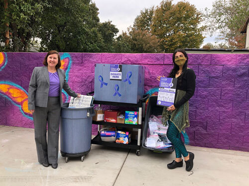 Executive Officer Lynda Gledhill dropped off more than 100 bags of travel-size toiletries to Wellspring Women’s Center Development and Communication Associate Jessica Mougharbel.